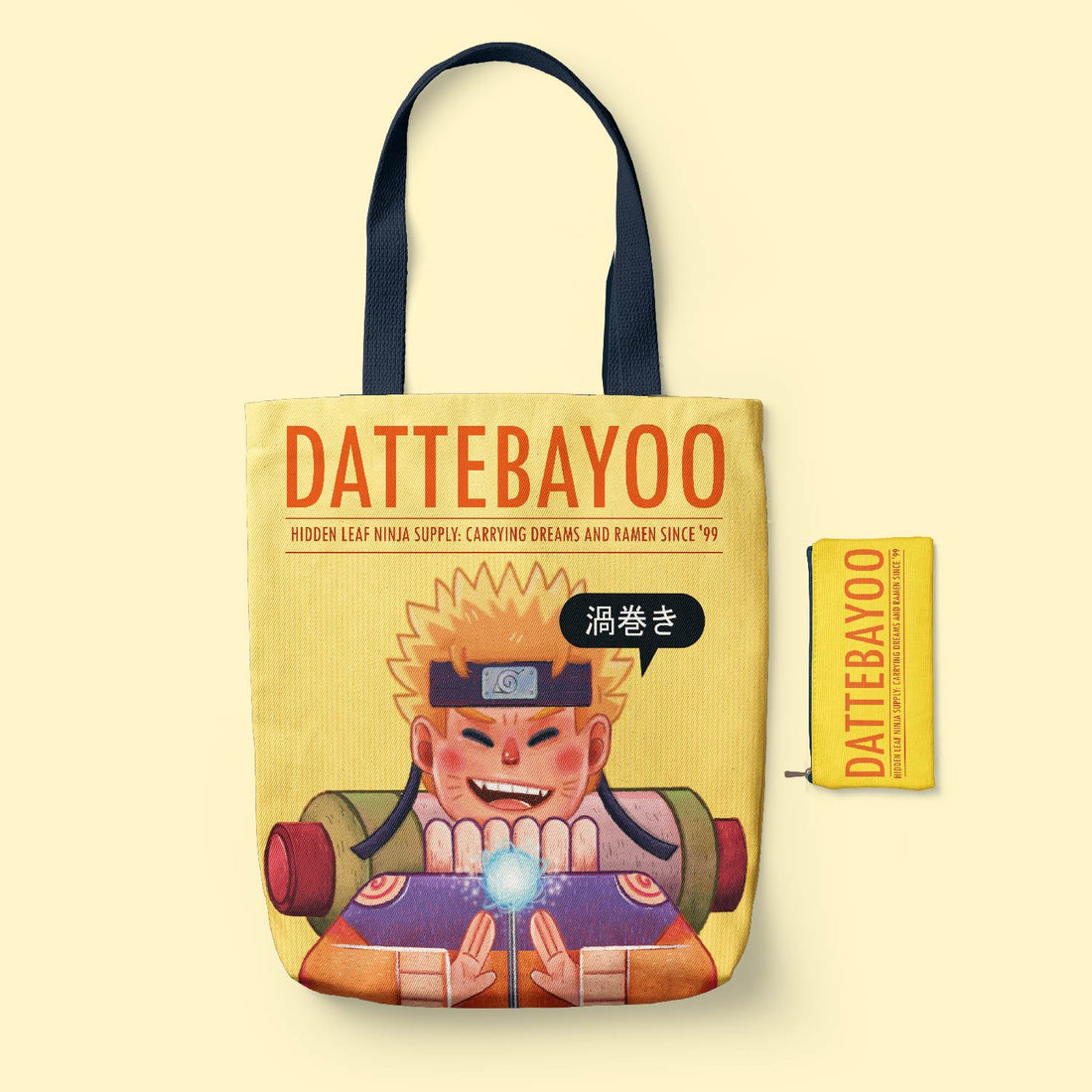 Living Waters Creative Studio Dattebayoo Classic Tote Bag with a character design and 'Dattebayoo' branding on a beige background